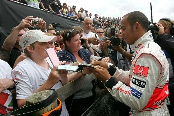 Goodwood Festival Of Speed: Lewis Hamilton McLaren Mercedes signs autographs