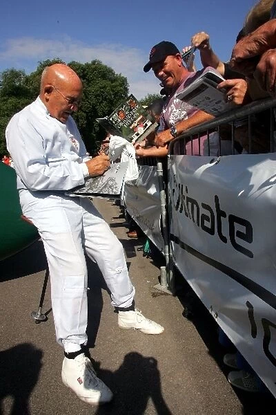 Goodwood Festival of Speed: Sir Stirling Moss signs autographs for fans