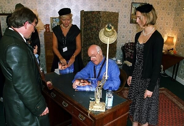Goodwood Revival 2002: Murray Walker signs copies of his new autobiography, Unless I m Very Much Mistaken