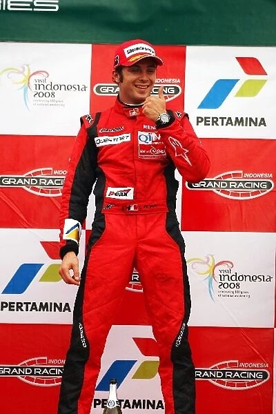 GP2 Asia Series: Race winner Luca Filippi Qi-Meritus celebrates on the podium, later to be disqualified