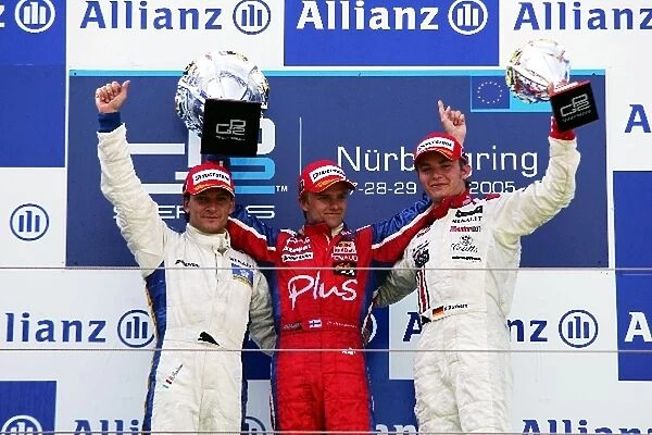 GP2: The podium: Giorgio Pantano Super Nova, second; Heikki Kovalainen Arden International, winner; Nico Rosberg ART, third