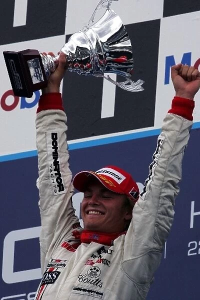 GP2: Race winner Nico Rosberg ART celebrates on the podium
