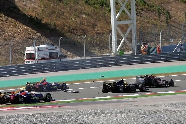 GP2 Series: Adrian Zaugg Arden International and Mike Conway Super Nova International crash at turn one at the start
