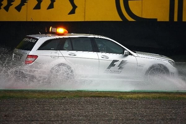 GP2 Series: Alan Van Der Merwe FIA Medical Car Driver drives the Safety Car in the rain as the race start was delayed