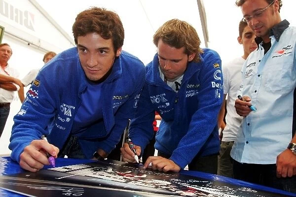 GP2 Series: Andy Soucek Super Nova Racing and Alvaro Parente Super Nova Racing sign the charity picture