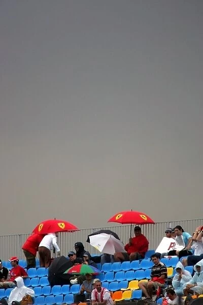 GP2 Series: Fans shelter from the rain: GP2 Series, Rd18, Istanbul Park, Istanbul, Turkey, 21 August 2005