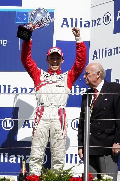 GP2 Series: Kazuki Nakajima Dams celebrates his third position on the podium