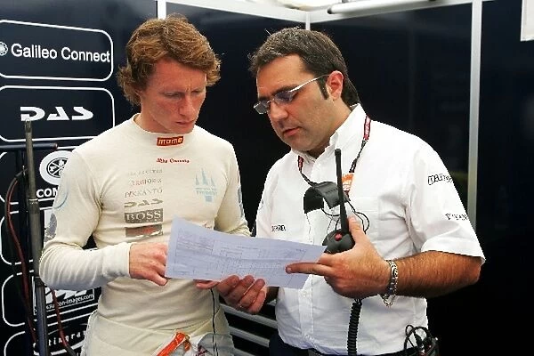 GP2 Series: Mike Conway Trident Racing talks with an engineer