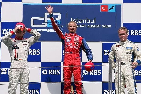 GP2 Series: Nico Rosberg ART, race winner Heikki Kovalainen Arden International and Adam Carroll Super Nova on the podium