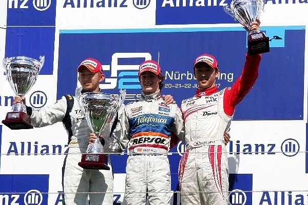 GP2 Series: The podium: Kohei Hirate Trident Racing, second; Javier Villa Racing Engineering, race winner; Kazuki Nakajima Dams third