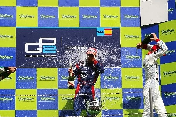 GP2 Series: The podium: Race winner Ernesto Viso iSport International and third placed Alexandre Premat ART Grand Prix