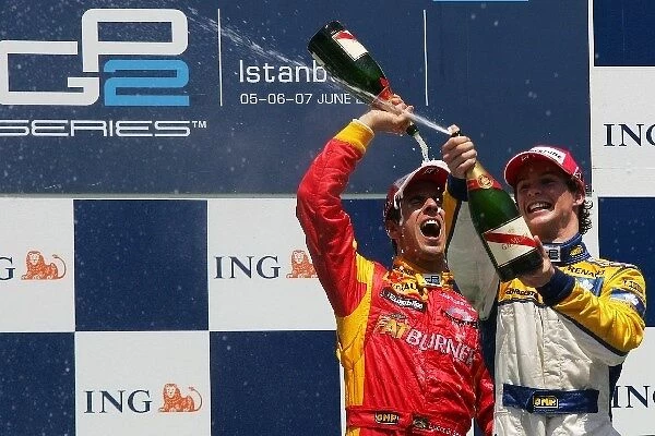 GP2 Series: The podium: race winner Lucas di Grassi Fat Burner Racing Engineering celebrates with second placed Javier Villa Super Nova Racing
