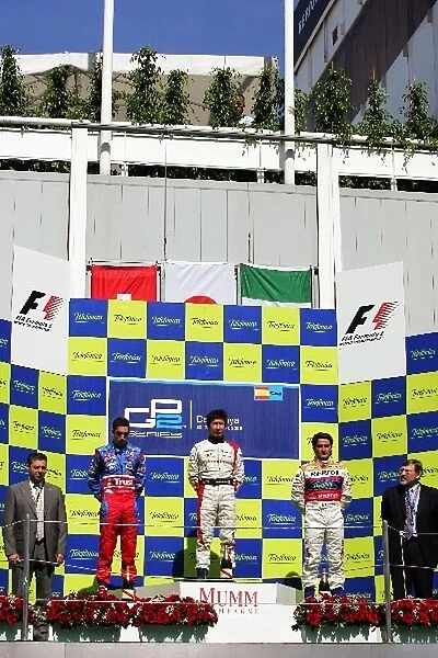 GP2 Series: The podium: Sebastien Buemi Trust Team Arden, second; race winner Kamui Kobayashi Dams; Giorgio Pantano Racing Engineering, third