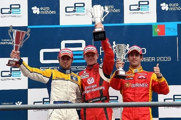 GP2 Series: Podium: Second place finisher Luca Filippi Super Nova Racing celebrates second on the podium, race winner Nico Hulkenberg ART Grand Prix