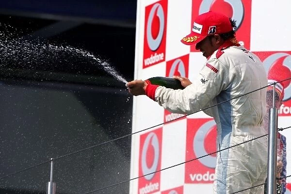 GP2 Series: Race winner Lewis Hamilton celebrates on the podium