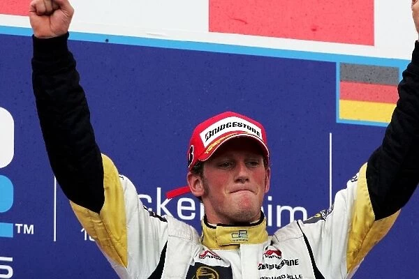 GP2 Series: Romain Grosjean ART celebrates his win on the podium