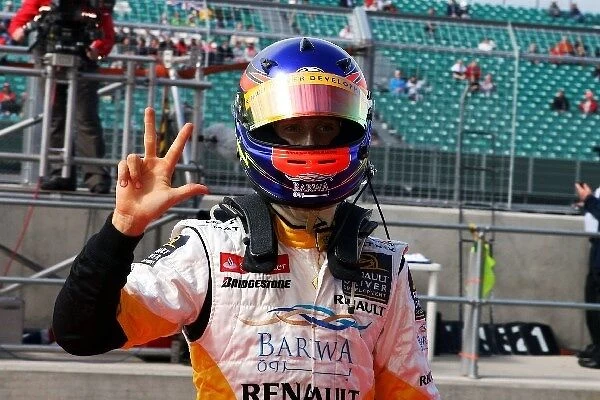 GP2 Series: Romain Grosjean Renault Third Driver celebrates his pole position