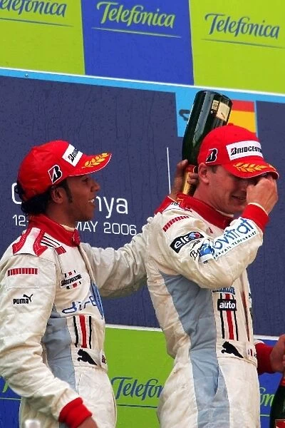 GP2 Series: Second placed Lewis Hamilton ART Grand Prix and race winner Alexandre Premat ART Grand Prix celebrate on the podium