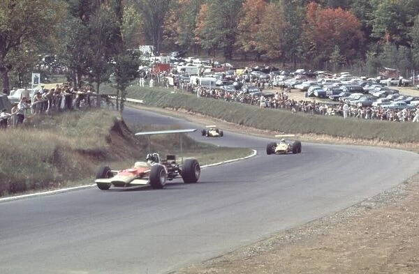 Graham Hill leads Denny Hulme and Bruce McLaren Canadian Grand Prix