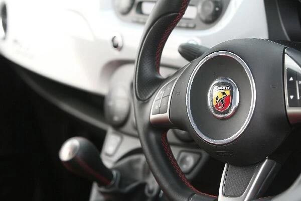 Grand Prix Shootout: Abarth badge on the FIAT 500 steering wheel