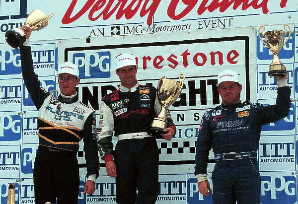 GREG MOORE On the podium with Robbie Buhl and Jeff Ward, Detroit 95 1999, Michael L. Levitt, USA LAT PHOTOGRAPHIC