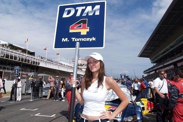 DTM. Grid girl of Martin Tomczyk (GER) Audi Sport Team Abt Sportsline Audi A4 DTM (2007).