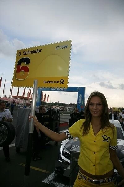 DTM. Grid girl of race winner Bernd Schneider 