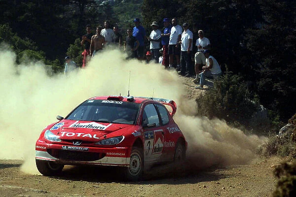 Harri Rovanpera,Peugeot 206 WRC, Acropolis Rally 2003. Photo: McKlein / LAT