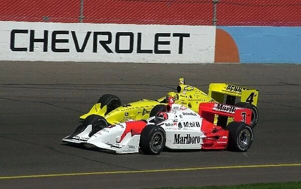 Helio Castroeves, (BRA), and Sam Hornish, (USA), raced their Dallara  /  Chevrolets hard all day long at the Copper World 200. Phoenix, Az. March