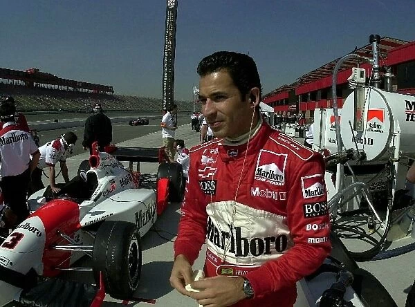 Helio Castroneves, (BRA), Team Penske prepares for practice at the Yamaha 400