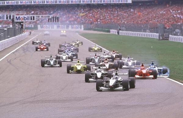 Hockenheim, Germany, 28th - 30th July 2000: Michael Schumacher, Ferrari and Giancarlo Fisichella collide at the start of the race