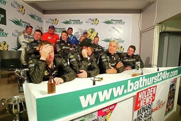 f2371. The Holden drivers prepare for the press conference after a crushing victory.