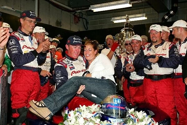 Indy Racing League: Buddy Rice celebrates his win with his girlfriend at the Indianapolis 500, Indianapolis Motor Speedway, Indianapolis, IN, 30, May, 2004