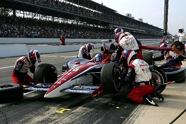 Indy Racing League: Buddy Rice makes a pit stop during the Indianapolis 500, Indianapolis Motor Speedway, Indianapolis, IN, 30, May, 2004. 04irl04a