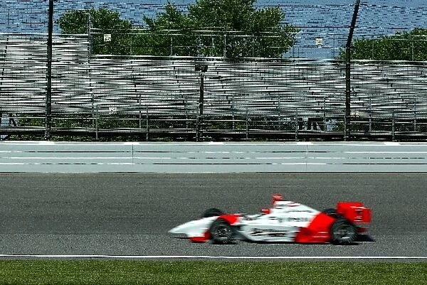 Indy Racing League: Helio Castroneves Team Penske flashes by the new Safe Walls installed in all four turns of the Indianapolis Motor Speedway