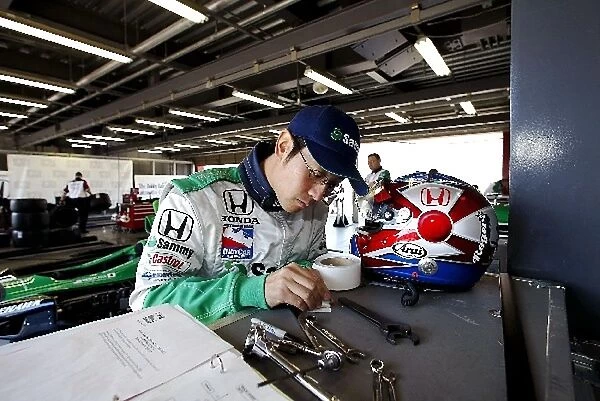 Indy Racing League: Roger Yasukawa Team Rahal G-Force Honda prepars his helmet before practice