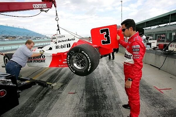 Indy Racing League Testing: Helio Castroneves Marlboro Team Penske checks out his car after sliding off track