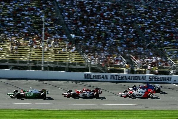 Indy Racing League: Tony Kanaan, Dan Wheldon, Sam Hornish Jr. and Dario Franchitti try to catch race winner, Bryan Herta in the Firestone Indy 400