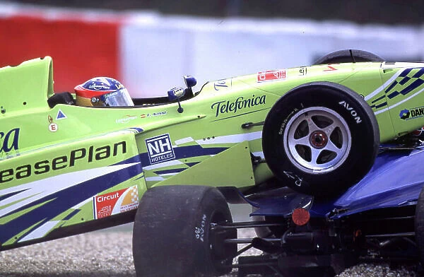International Formula 3000 Championship. Nurburgring, Germany. 19th - 20th May 2000. Fernando Alonso parks on top of Ricardo Mauricio after being forced of the track by pole sitter David Saelens. World Bellanca / LAT Photographic Te