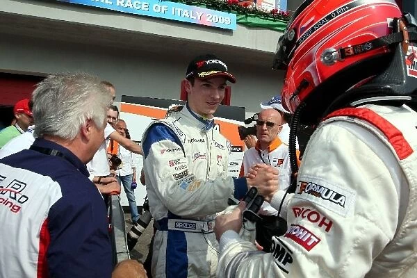 International Formula Master: Race 2 winner Alexander Rossi, ISR, left, congratulates Josef Kral, JD Motorsport, right