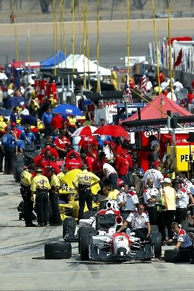 IRL crews prepare for the first practice session for the Radisson Indy 225