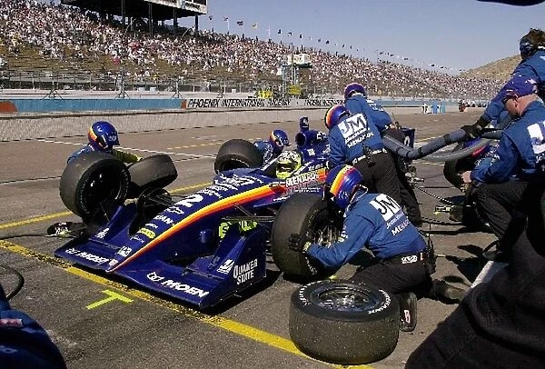 Jacques Lazier, (USA), Dallara  /  Chevrolet, makes his final pit stop on the way to a sixth place finish at the Copper World 200. Phoenix, Az. March