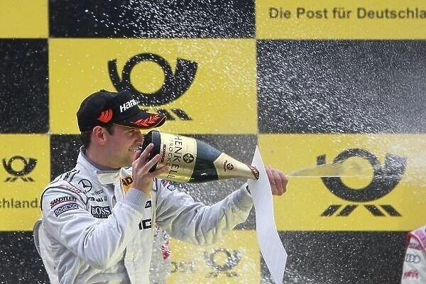 DTM. Jamie Green (GBR), AMG Mercedes, celebrates his second place on the