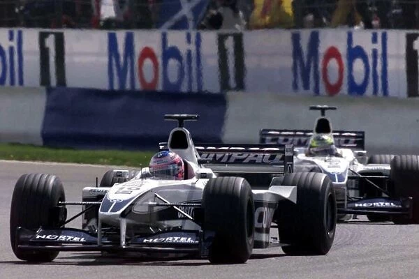 Jenson Button leads Ralf Schumacher