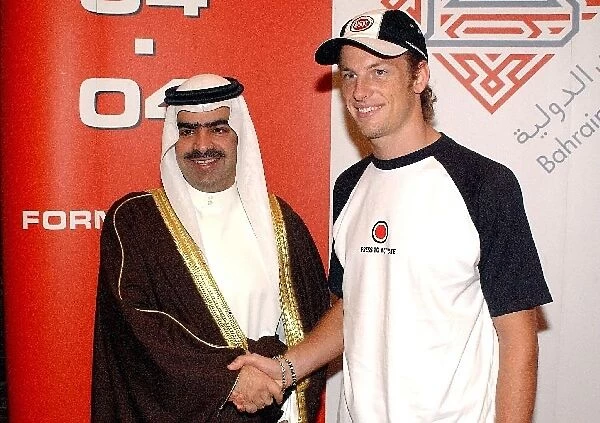 Jenson Button Visits Bahrain: Jenson Button, BAR Honda, right, meets His Excellency Shaikh Fawaz bin Mohammed Al Kalifah, Chairman of the Bahrain