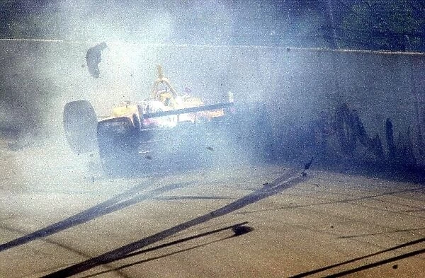 Jimmy Vasser crashed, but was unhurt after a collision with Kenny Brack at the start of the CART Grand Prix of Chicago. Chicago Motor Speedway, Chicago, Il. 06