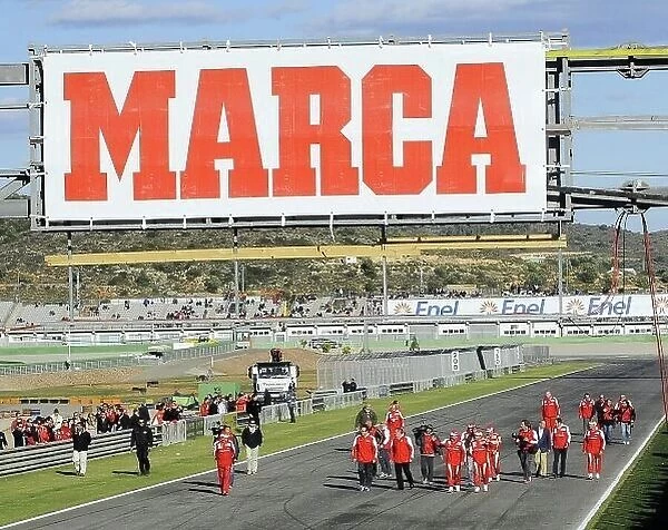 JM RUBIO. Fernando Alonso (ESP) and Felipe Massa (BRA) walk the circuit.