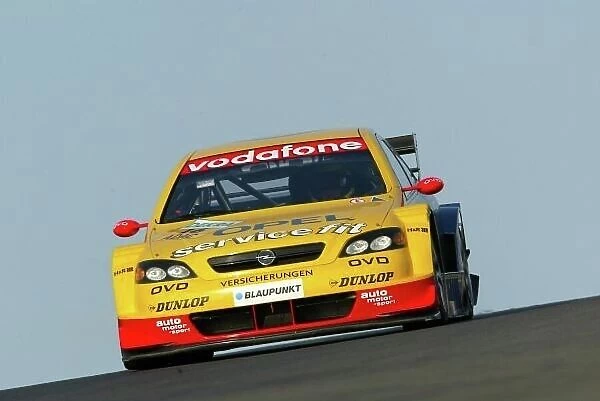 DTM. Joachim Winkelhock (GER), OPC Euroteam, Opel Astra V8 Coupe, finished fifteenth.