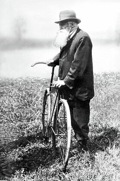 John Boyd Dunlop. Portrait with the first pneumatic tyres on a bicycle. World Copyright: LAT Photographic Ref: Black & print