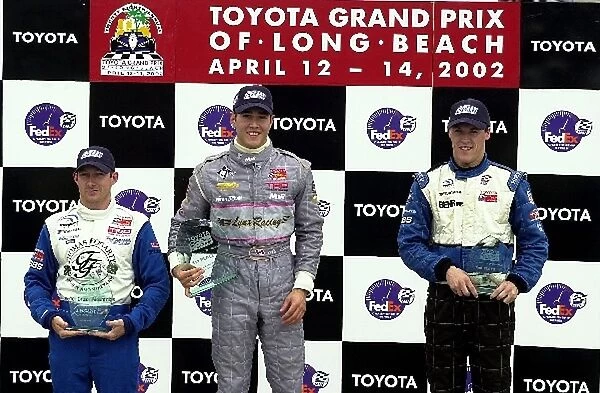 Jon Fogarty (l), Michael Valiante (c), and Alex Gurney (r), made the podium at the Long Beach Atlantic race. Toyota Grand Prix of Long Beach. Long Beach, Ca. 14 April, 2002
